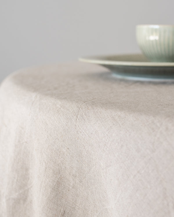 Driftwood linen tablecloth styled on dining table