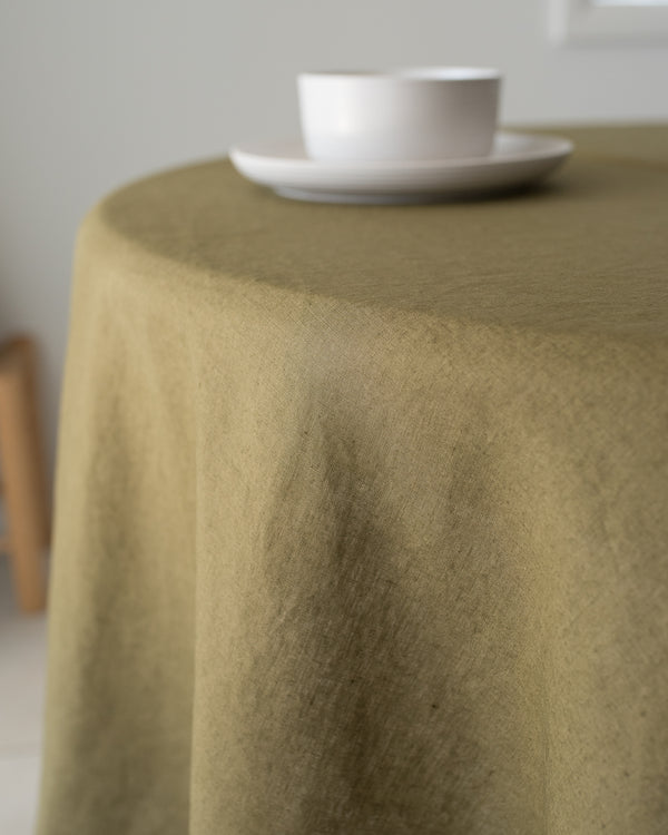 olive linen tablecloth natural earthy tone dining setup