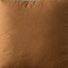 clay cushion on a white chair with a neutral background