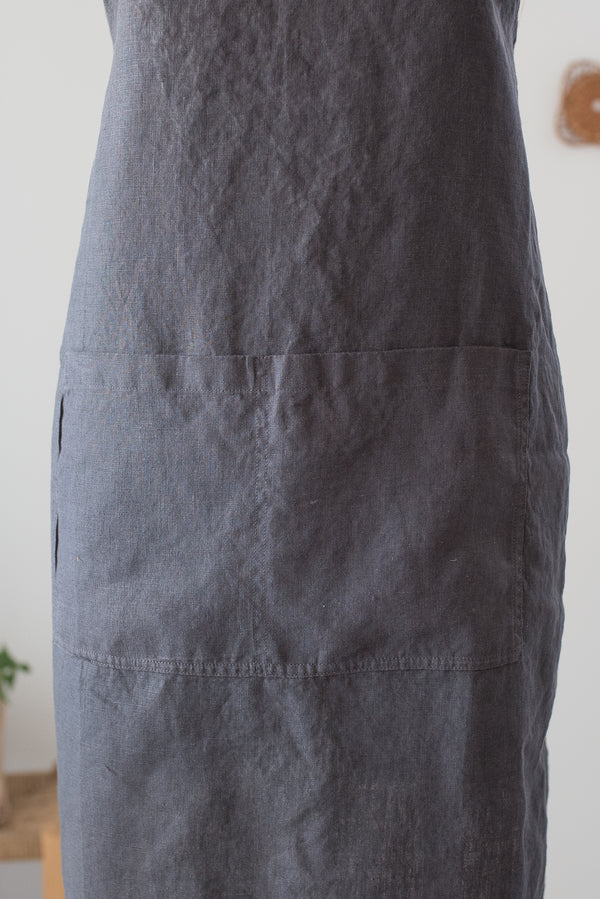Dark gray apron on a white background