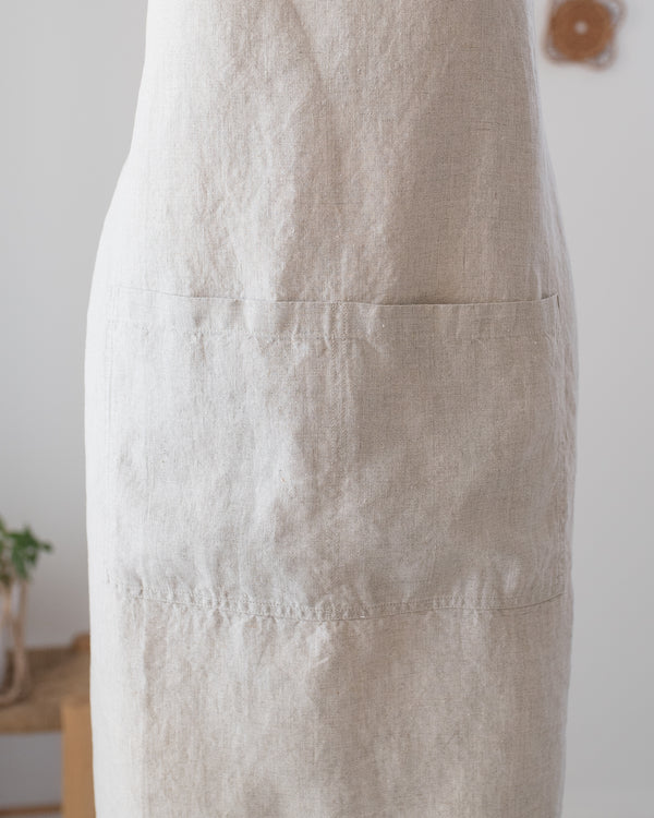 Beige apron on a white background