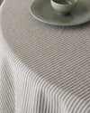 olive strip linen tablecloth natural earthy tone dining setup